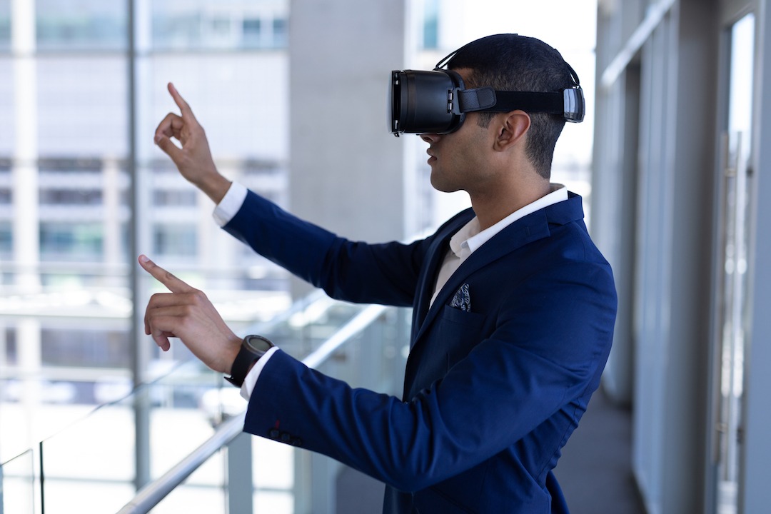 businessman using vr headset for mixed reality in business