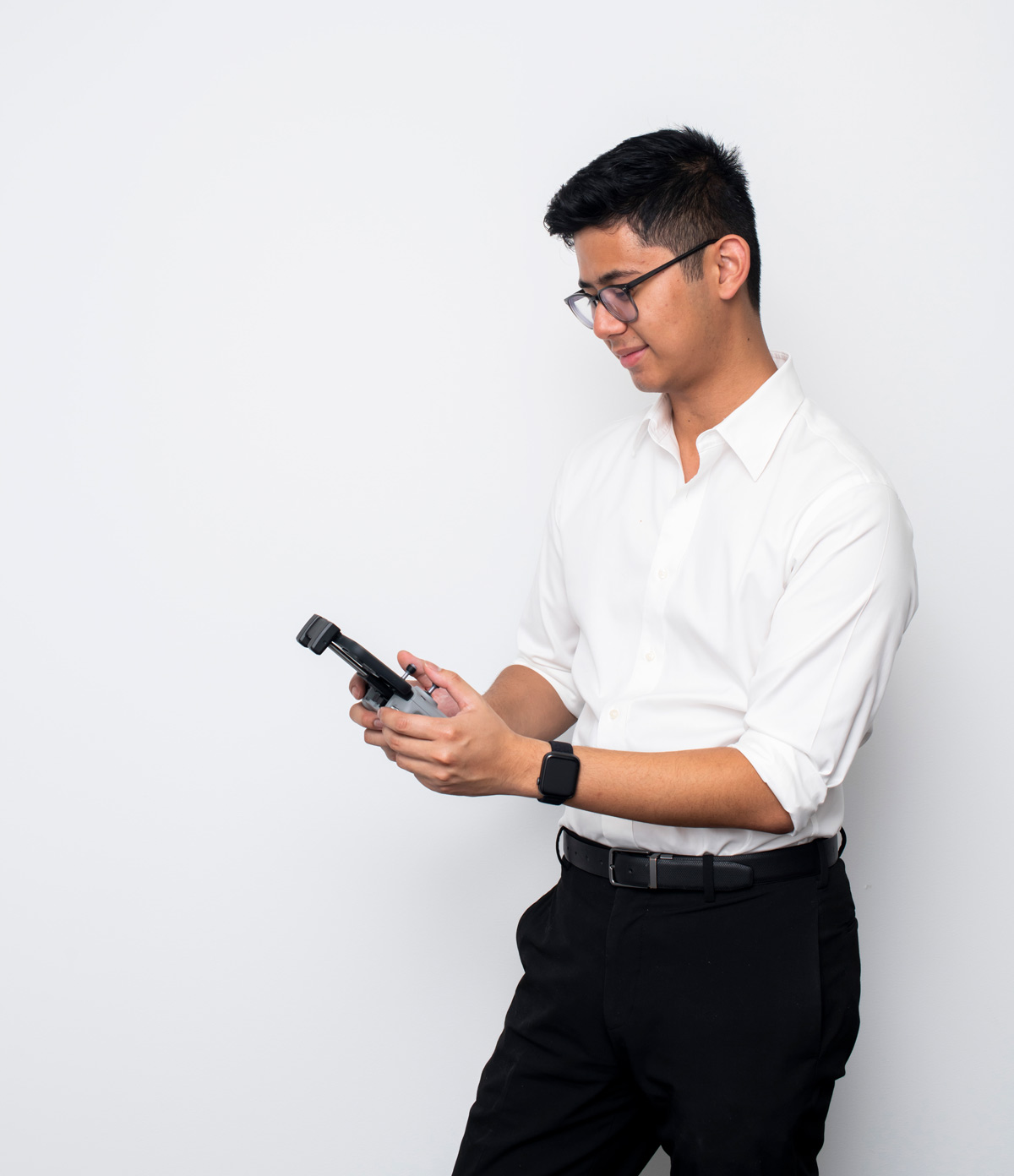 Connected Platforms technician working with a support device