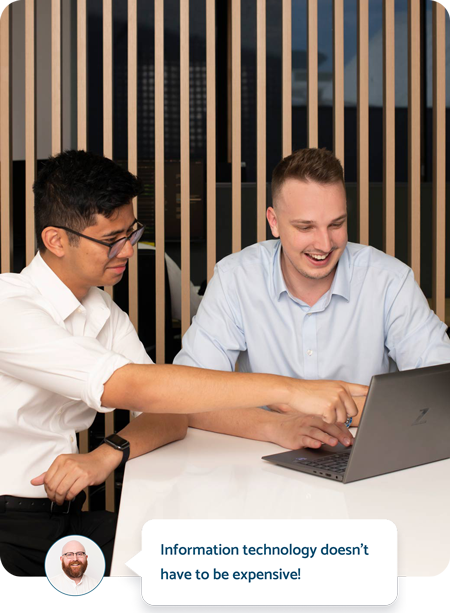 Two people looking at a computer screen | Featured image for the IT Support for Business Home Page by Connected Platforms.