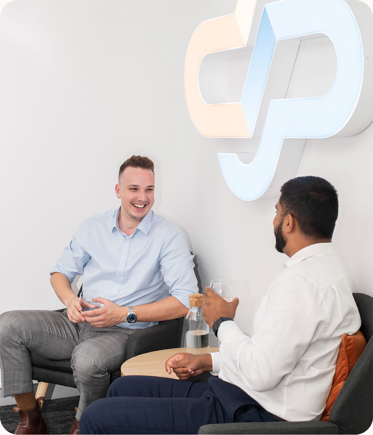 Connected Platforms team members discussing client technology