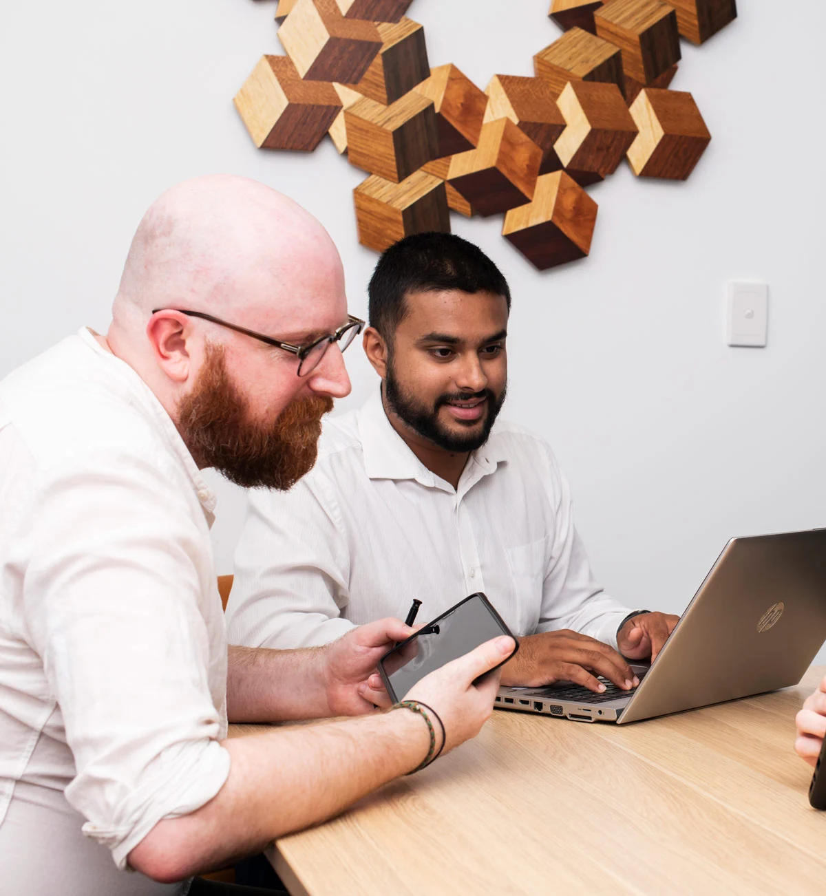 Connected Platforms team members reviewing a client system